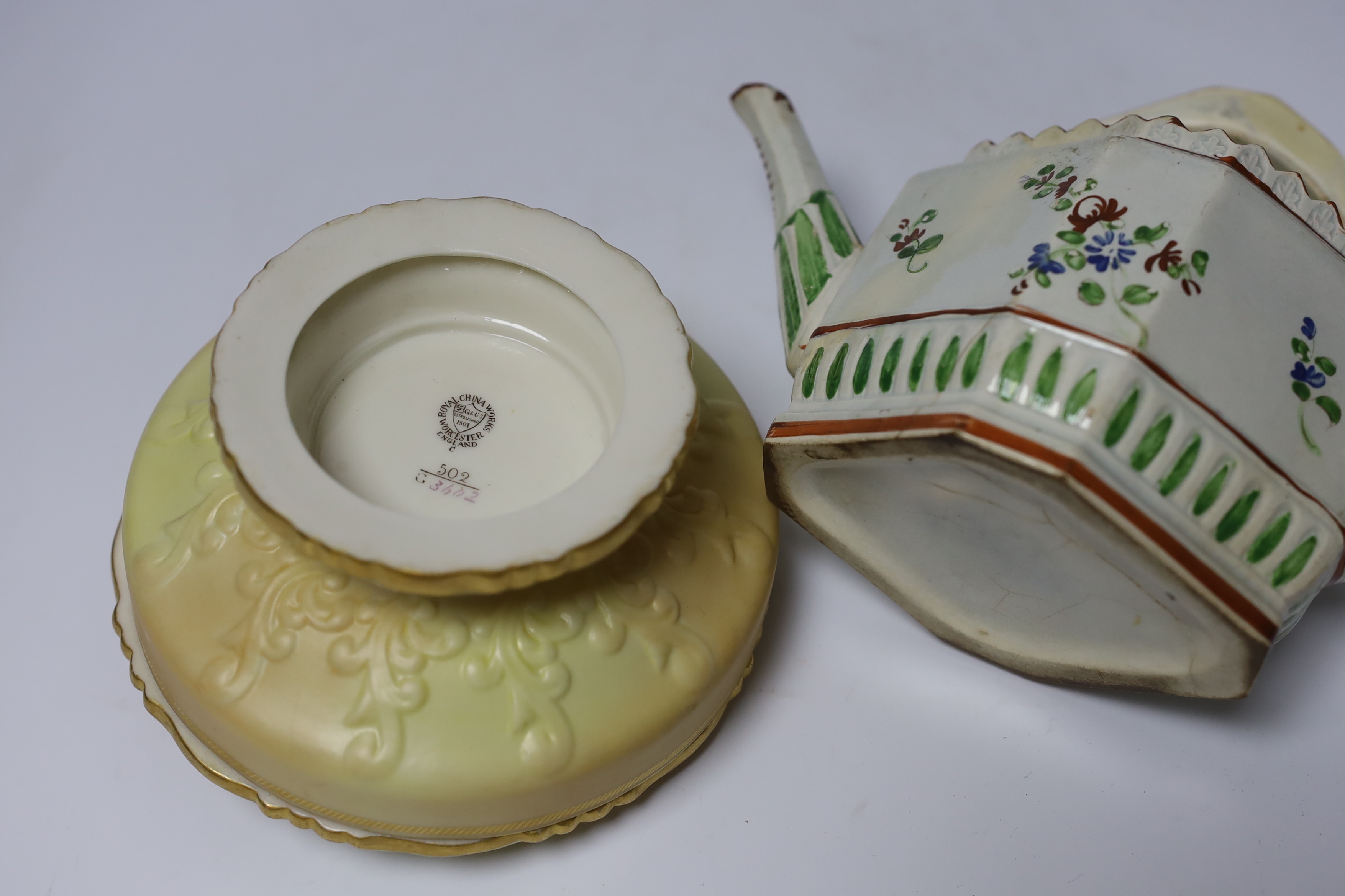 Three pieces of Royal Worcester blush ivory porcelain and an early 19th century pearlware teapot, tallest 19cm